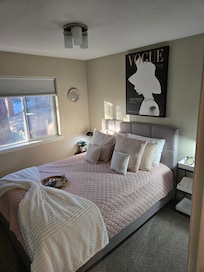 First bedroom to the right of stairs