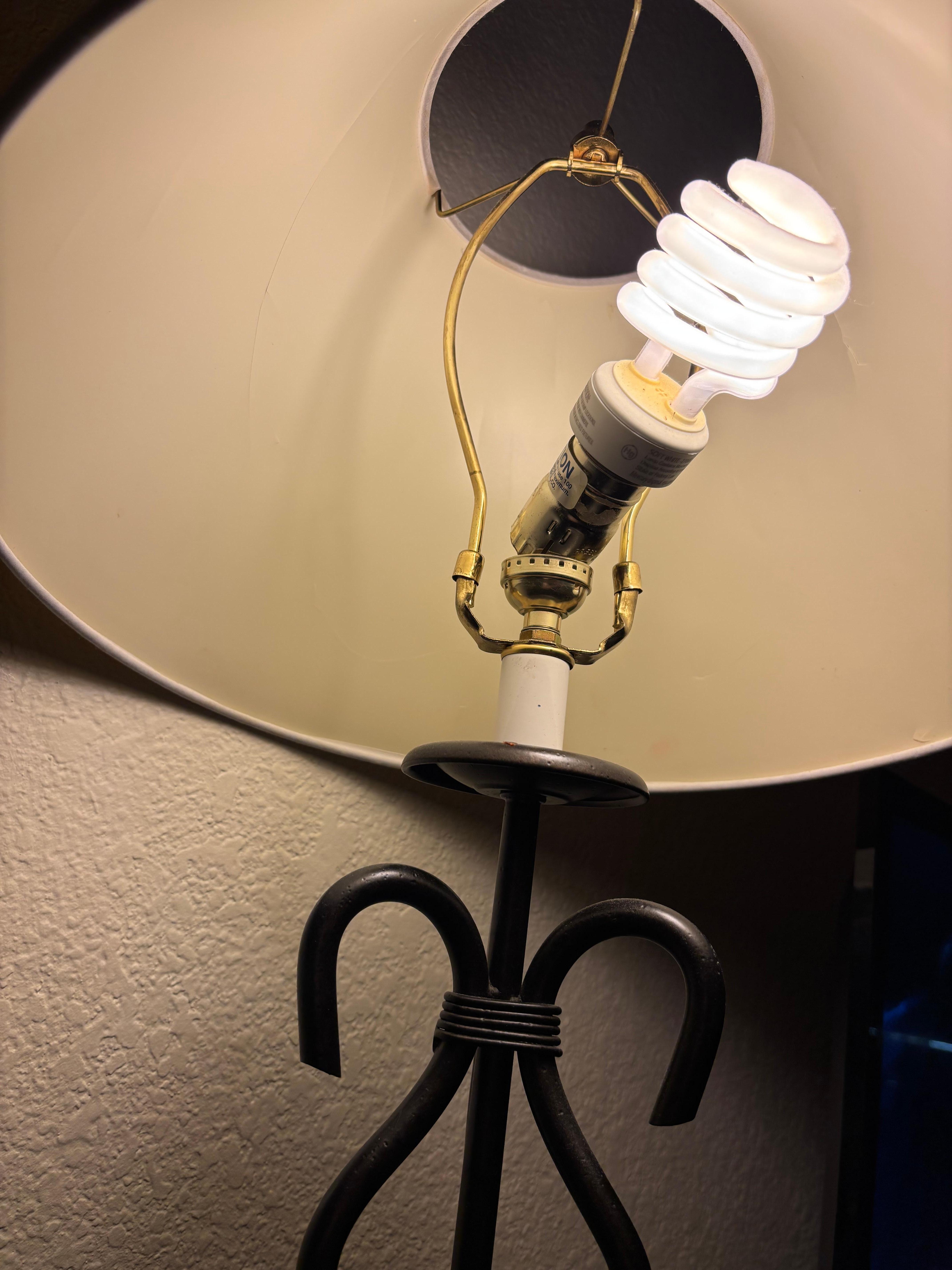 Lightbulb hanging from lamp