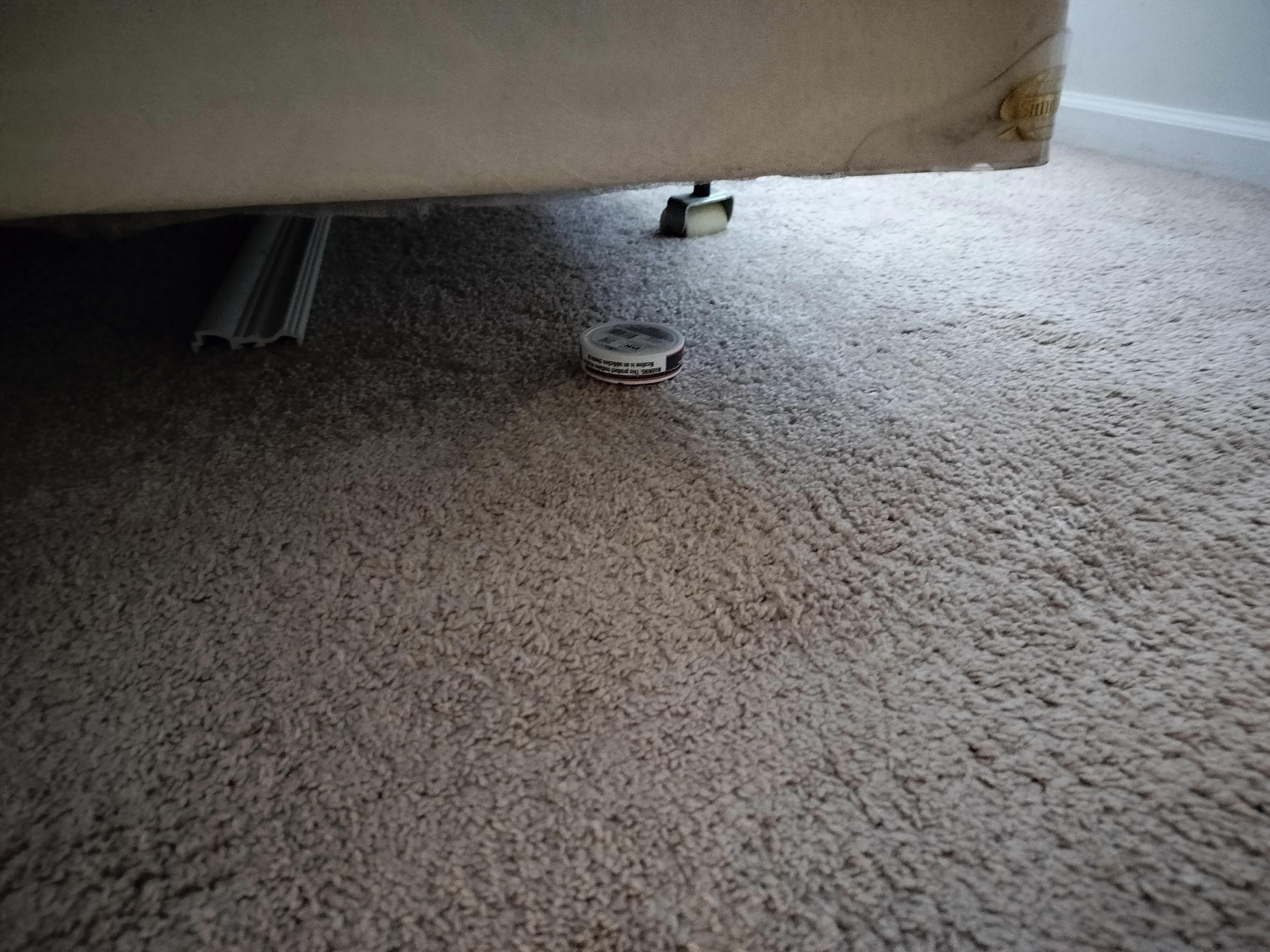 Tobacco tin left under bed