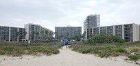 view of Saida Towers from beach...Condo is top left corner of center tower.