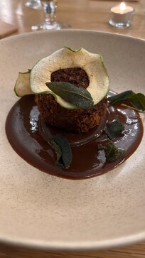 black pudding Bon Bon with raisen puree