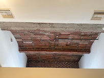 Exposed original, or not, ceiling structure.