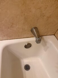 Rust around the inside of the tub.