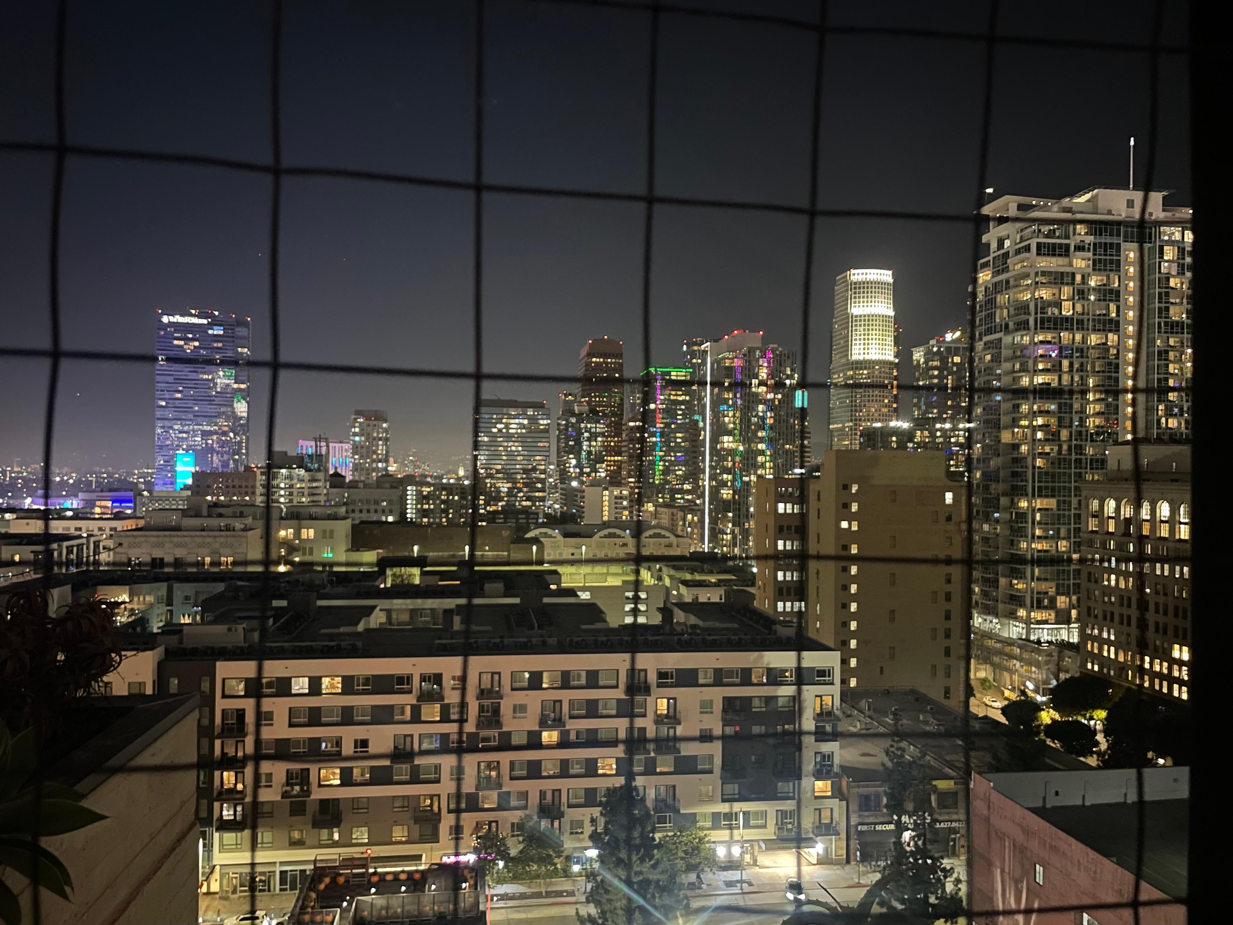 View from the pool on the rooftop at night.