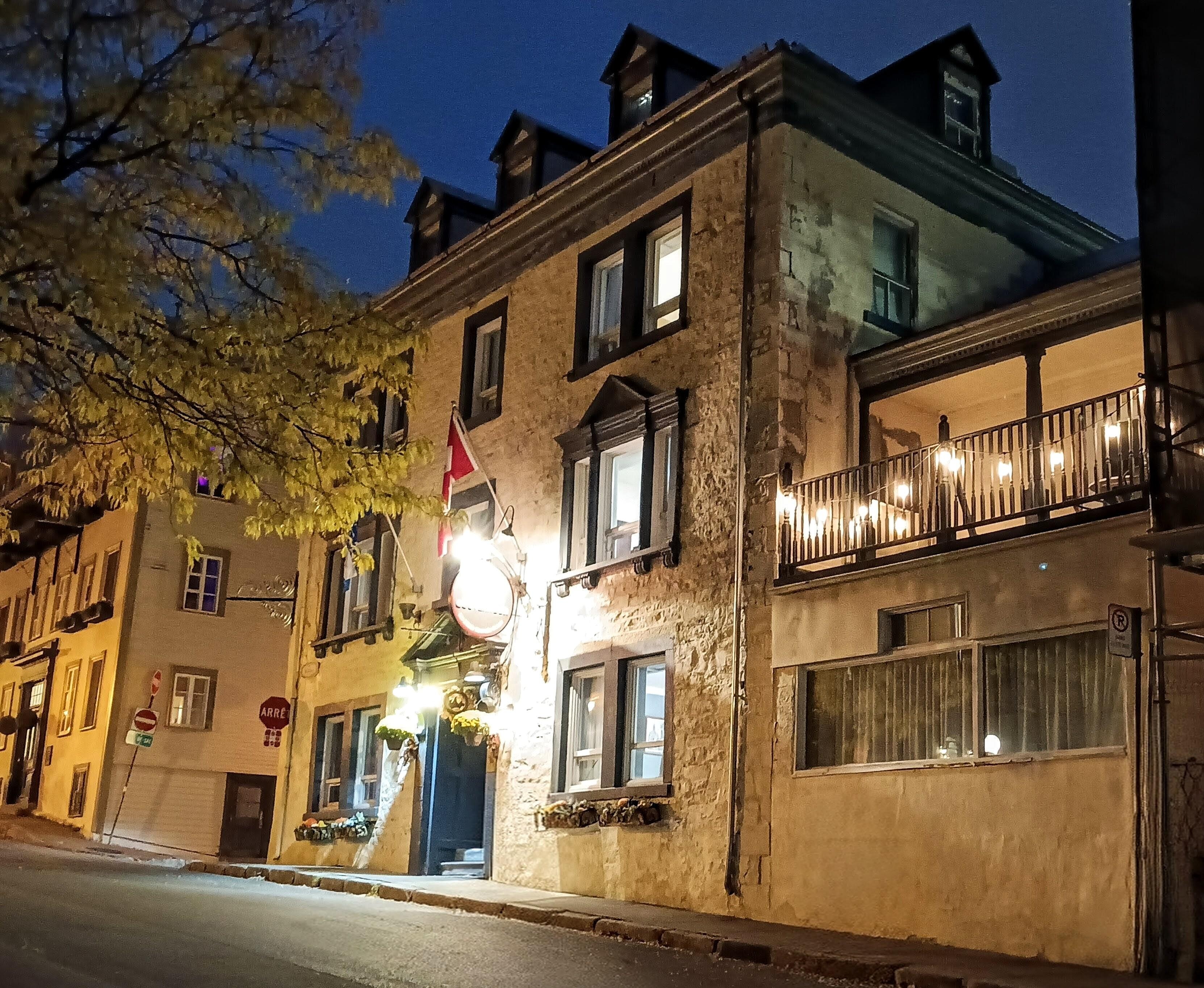 Exterior of our hotel.  The second floor balcony with string lights was ours.