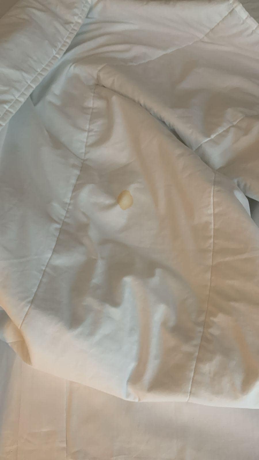 Stained bed linen presented as a “clean room”