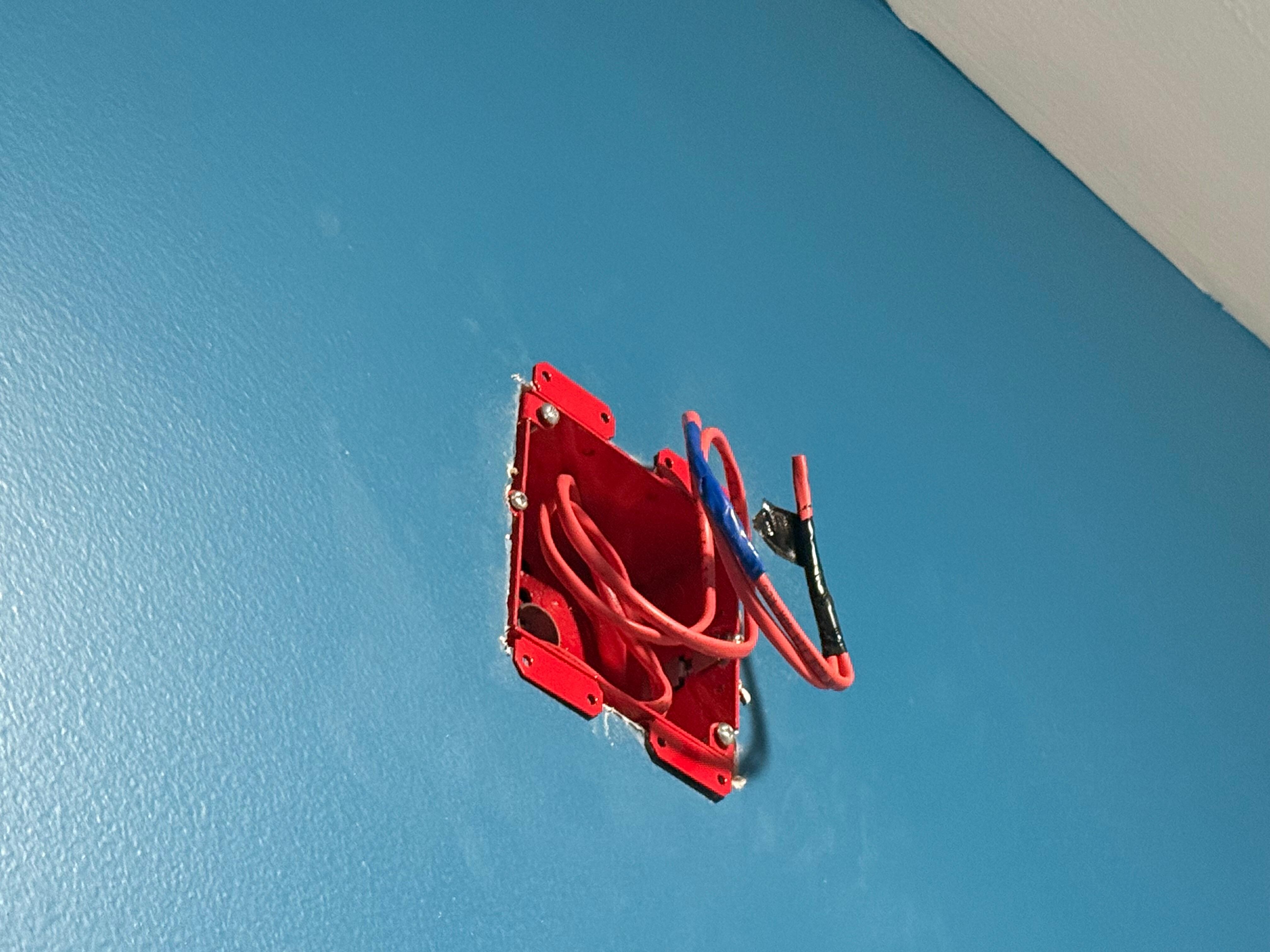 Exposed wires in the pool bathroom