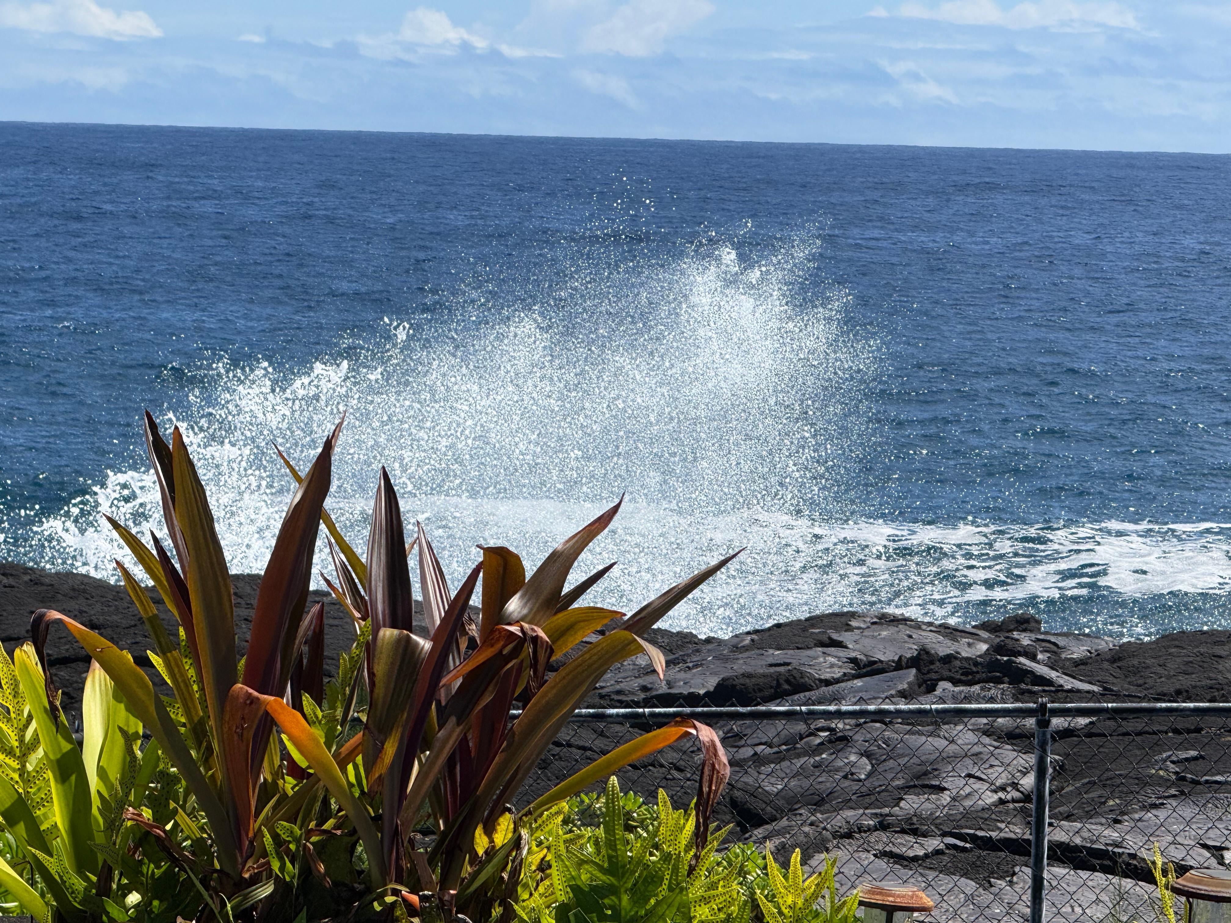 Splashing waves against the lava.