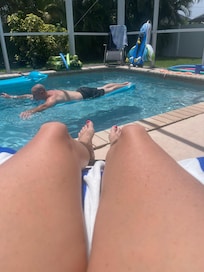 Just relaxing by the pool enjoying doing nothing.
