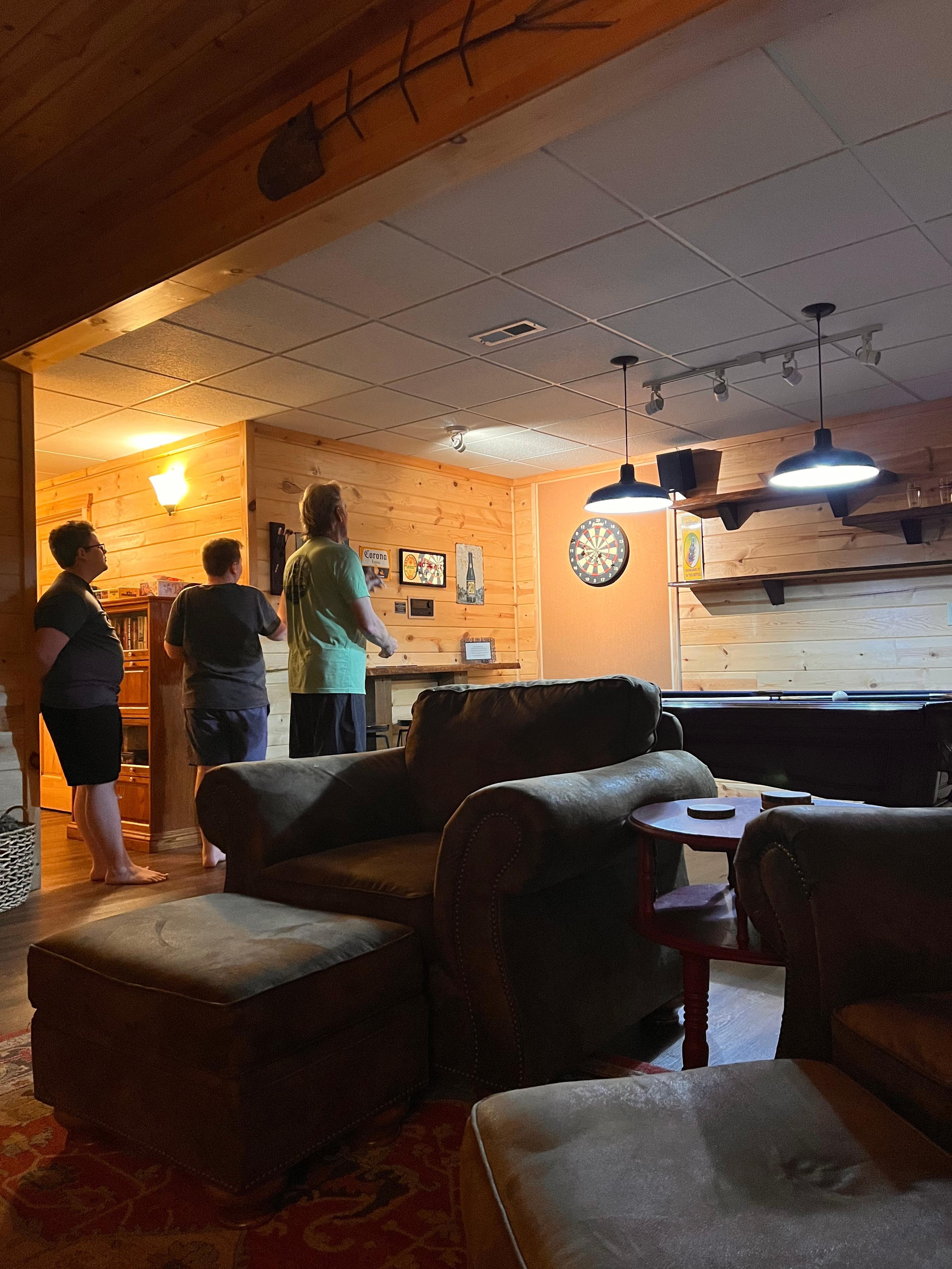 Game area, darts and pool.