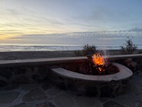 Fire on the patio overlooking beach/ocean