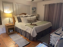 Beautiful cozy, comfy king bed.