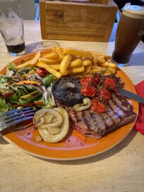 Food is good AND incredibly affordable. Big steak plate $15!