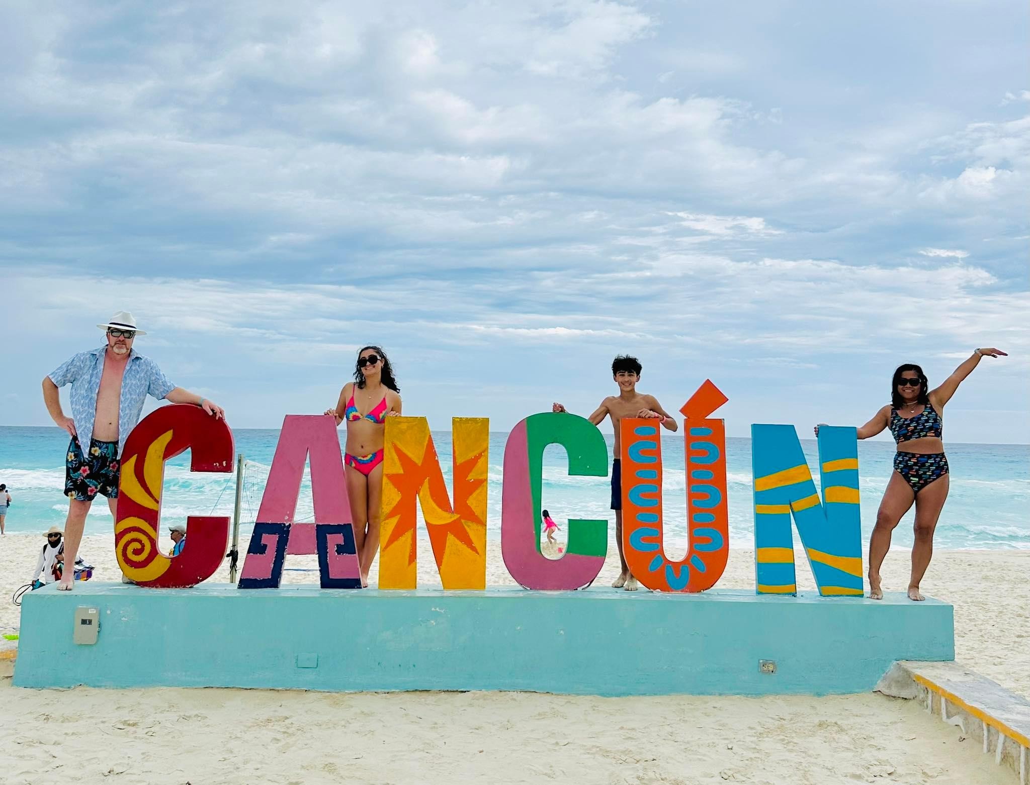 i thought its so cool, they have their own cancun beach sign.