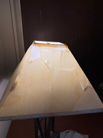 Cracked and cigarette stained lamp shade