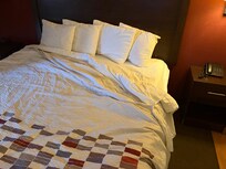 Sheets look and feel dirty, bed not made