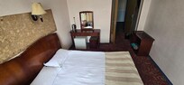 Basic room, comfy bed, clean towels. Working fridge. Good wifi.