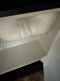 Refrigerator that would not close because it was frozen over