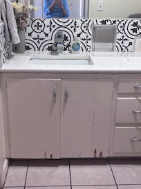 chipped and dirty cabinets