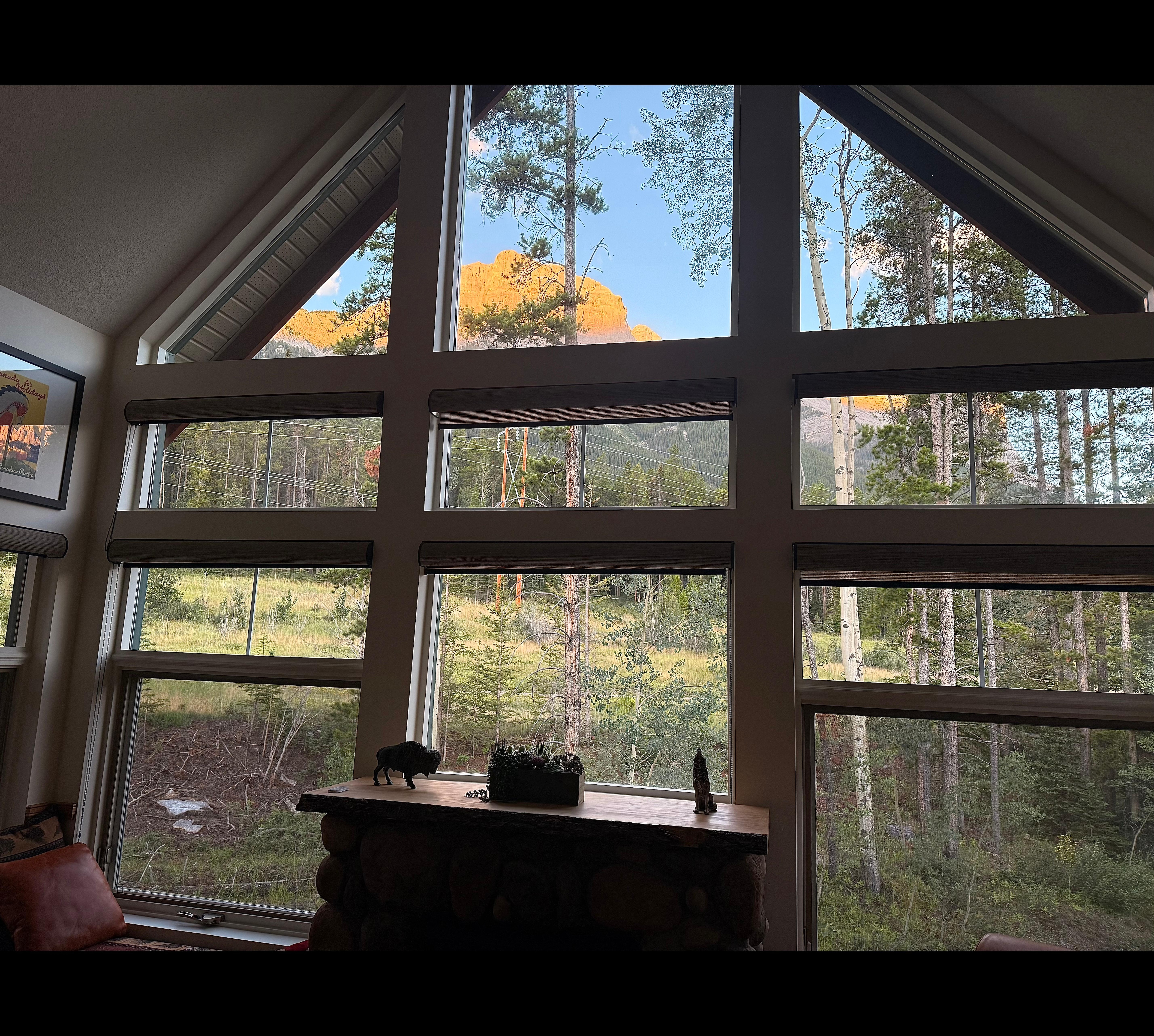 The recently thinned trees allowed us to view Three Sisters Mountains from the living room windows. 
