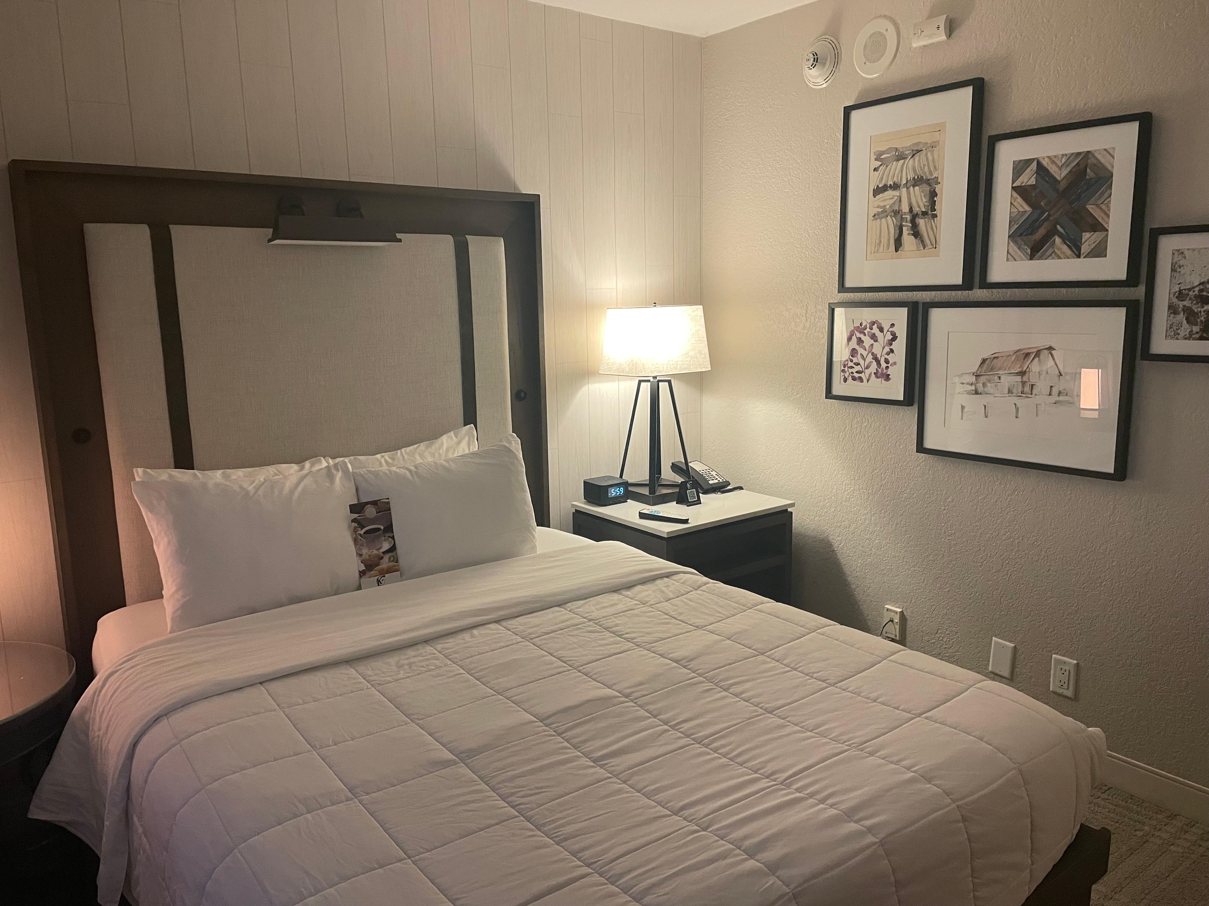 Comfy bed (love the clean white bedding)