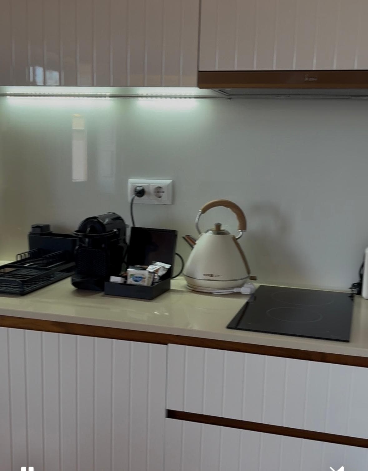 Kitchen with stove top. 