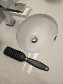 My hairbrush was actually bigger than the bathroom sink! We've never seen such a tiny sink!