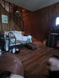 The stairs leading the the master bedroom from the living room.
