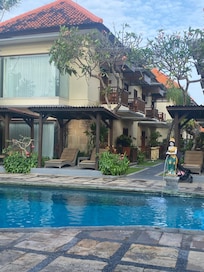 Small pool with sun lounges