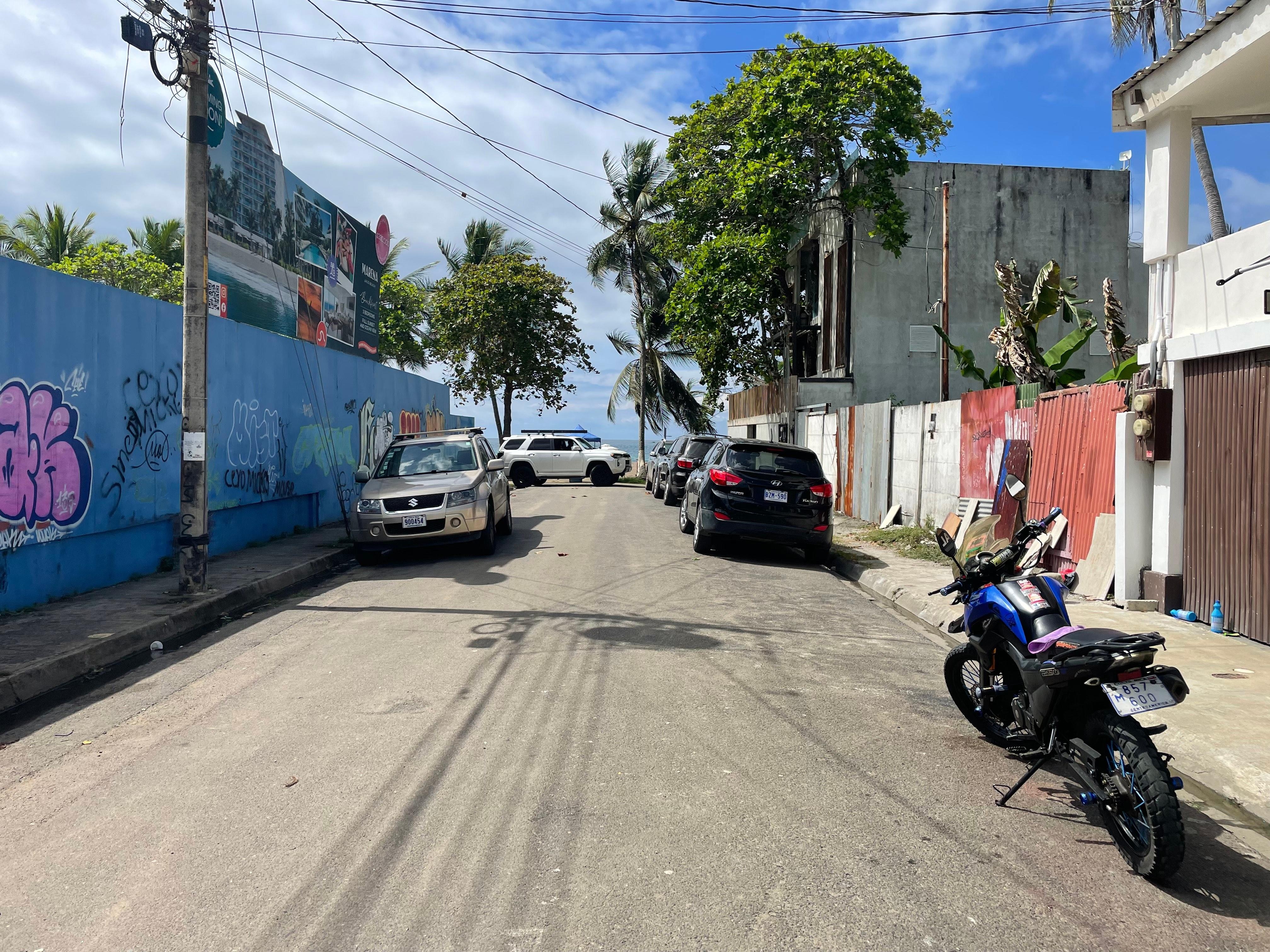 Outside the accommodations. Street dead ends into the beach.