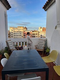 Morning view of Barcelona, overlooking a sweet quiet courtyard of rooftops.