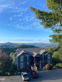 View of Mountains from front of house, back of home has unobstructed views!