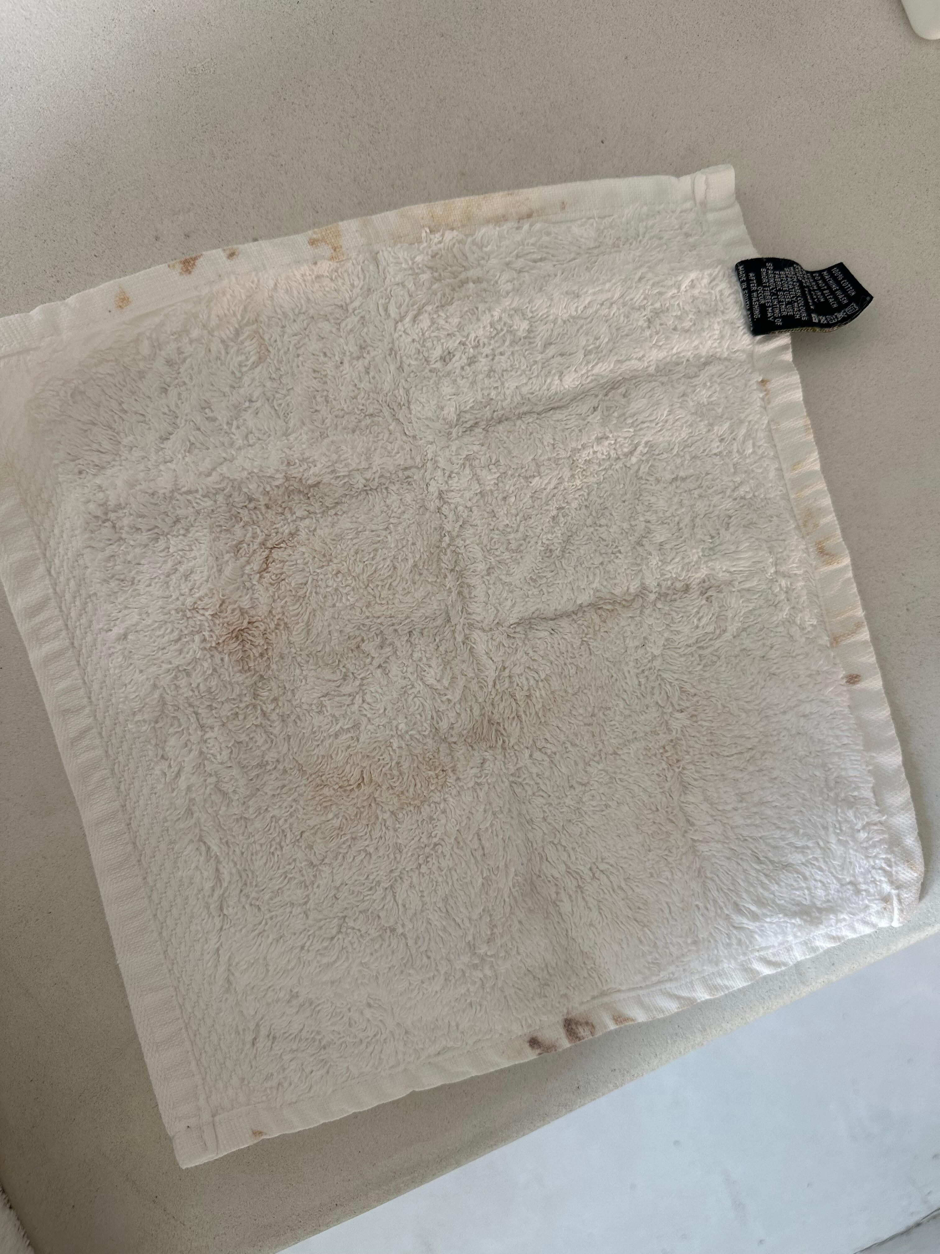 Another stained face cloth 