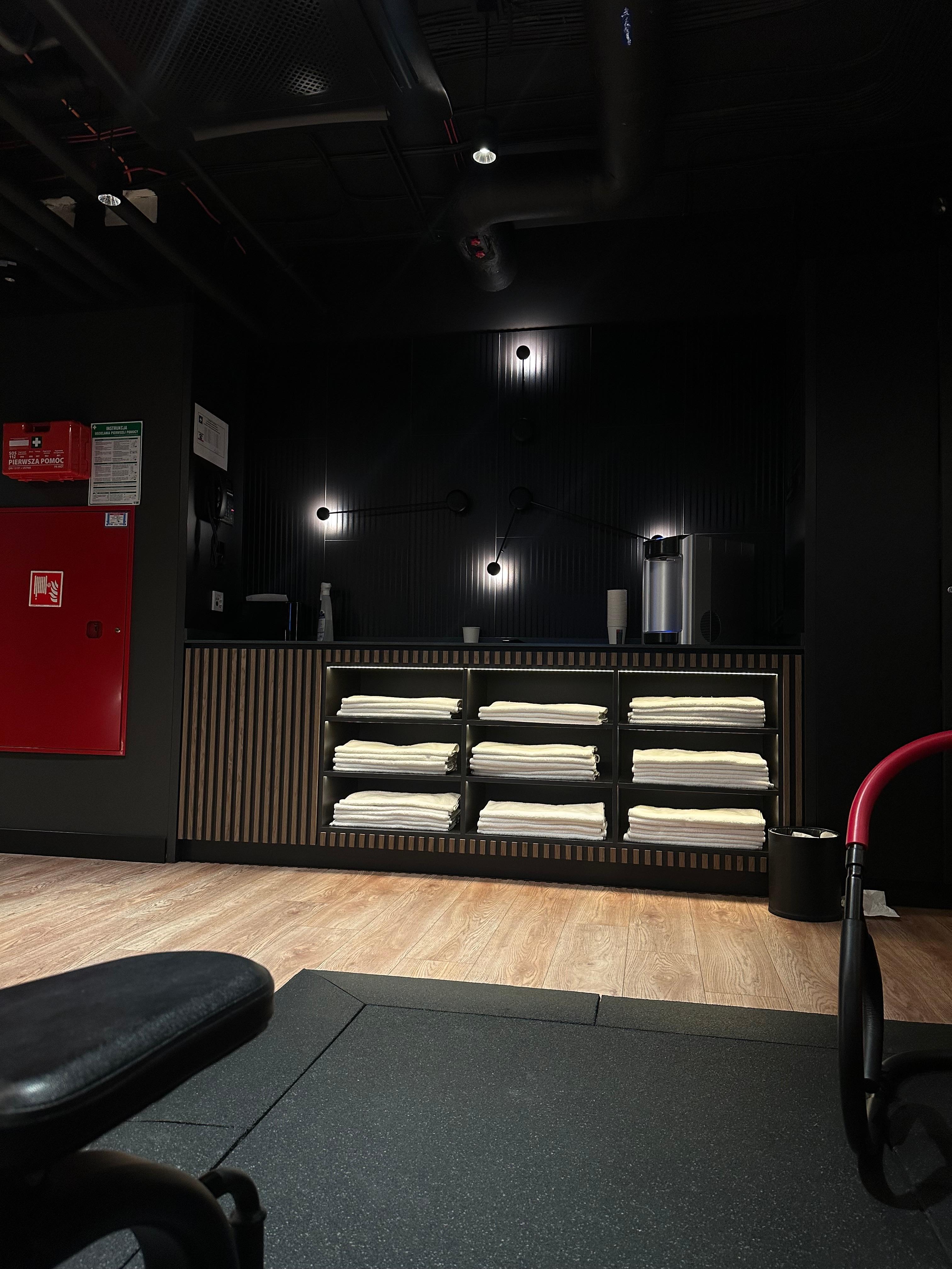 The gym has clean towels and a water dispenser.