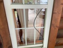 Wire going through master bedroom window with broken lock