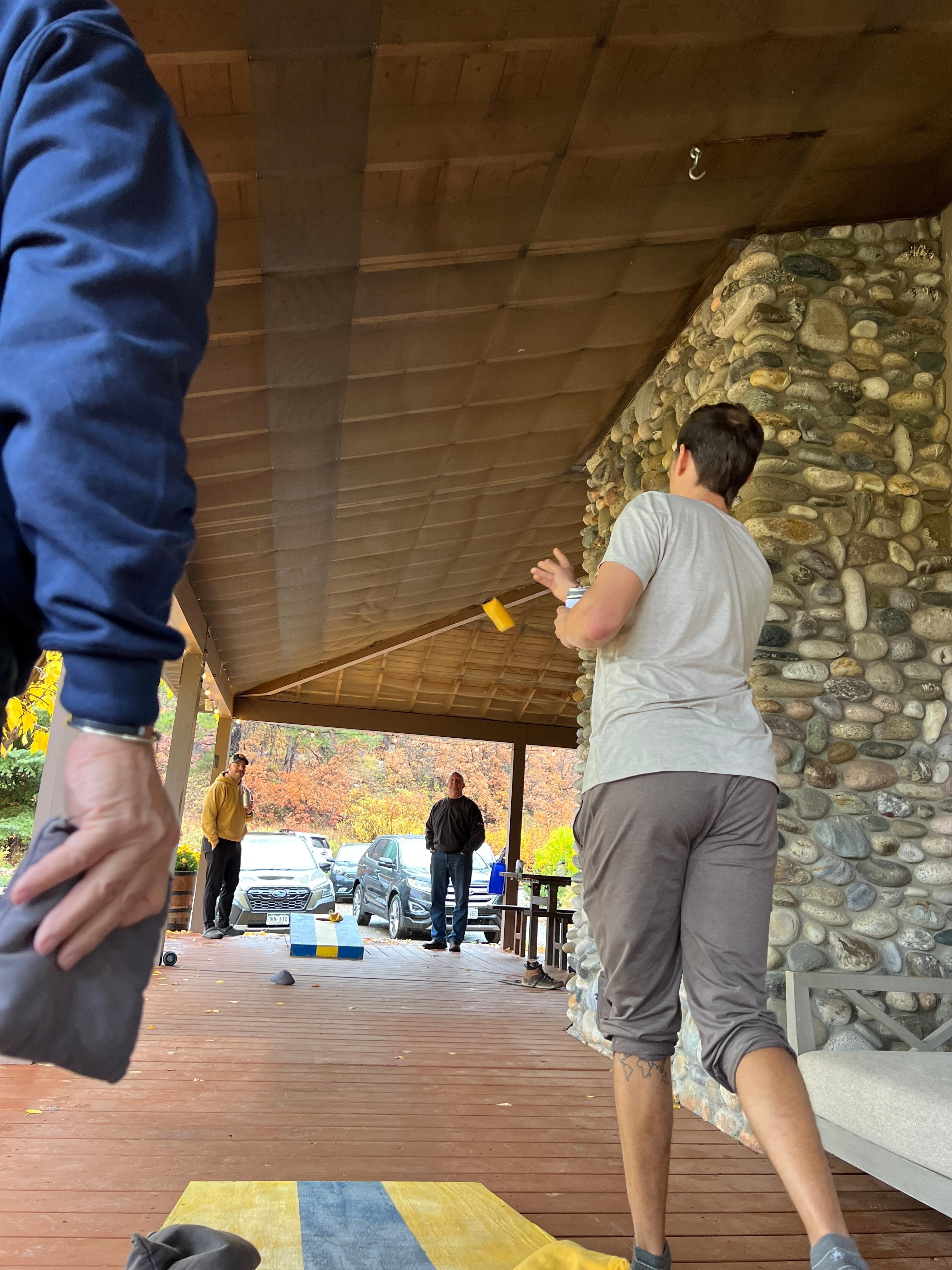 Moved corn hole to the porch