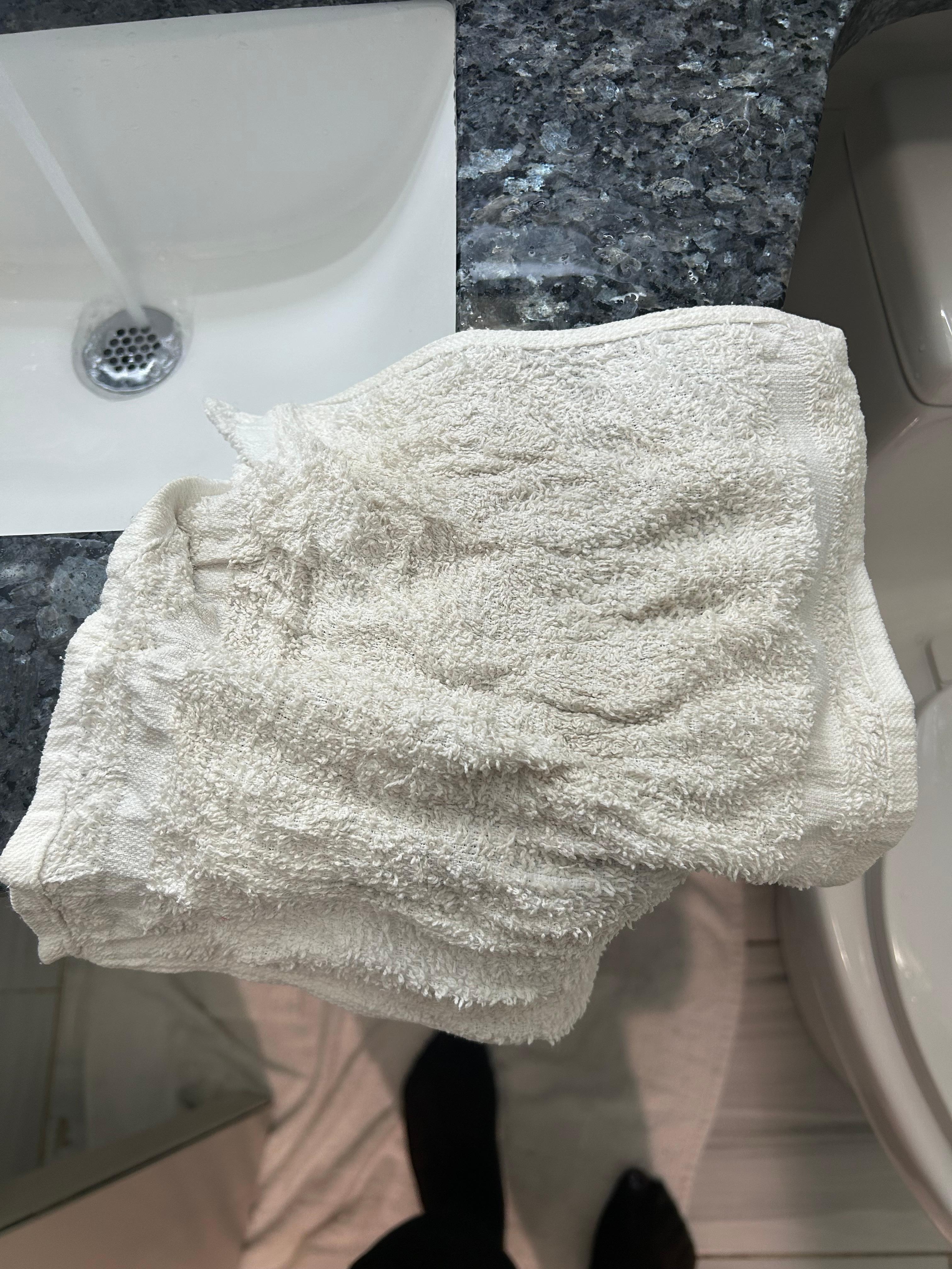 Dirty towels found in the bathroom upon my arrival 