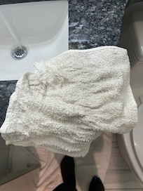 Dirty towels found in the bathroom upon my arrival
