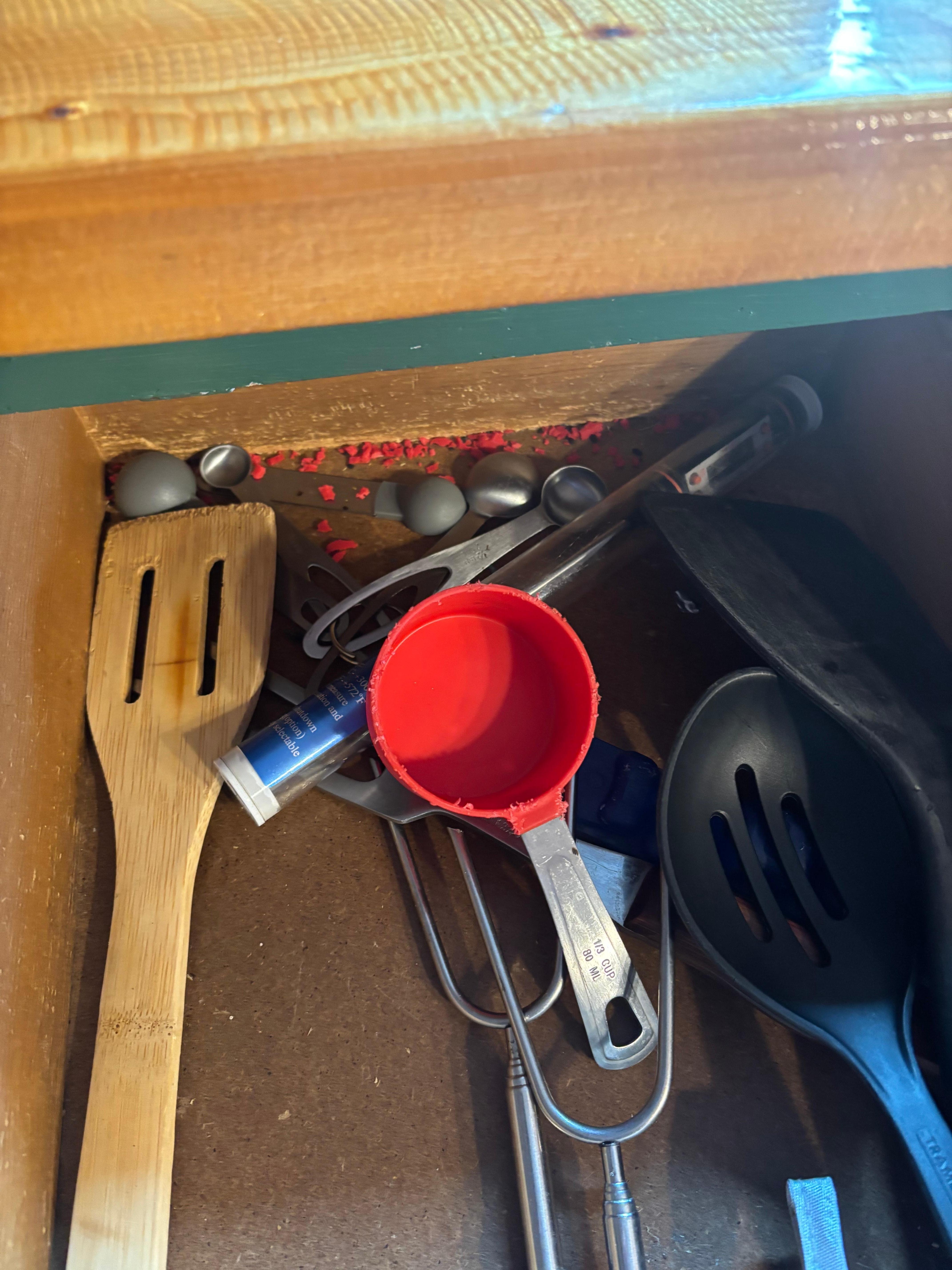 Chewed up measuring cup bits from possible rodent