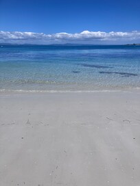 Rangiputa beach. White sand and turquoise crystal clear water.