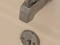 This faucet never stopped leaking and water was generally all over the tub and sometimes outside of it.