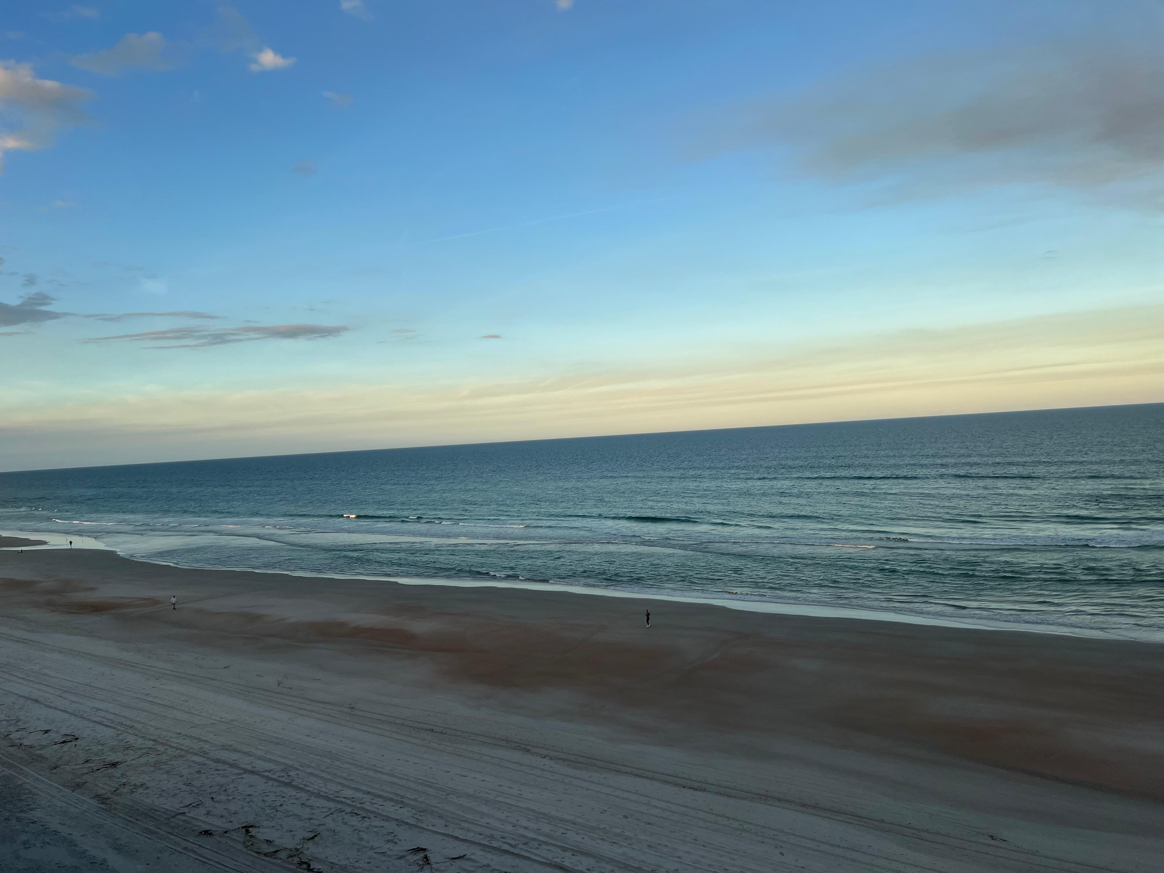 Late afternoon beach view from condo’s balcony
