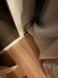 AC unit coming apart in bedroom. The one in the living room was worse, but I didn't get a picture.