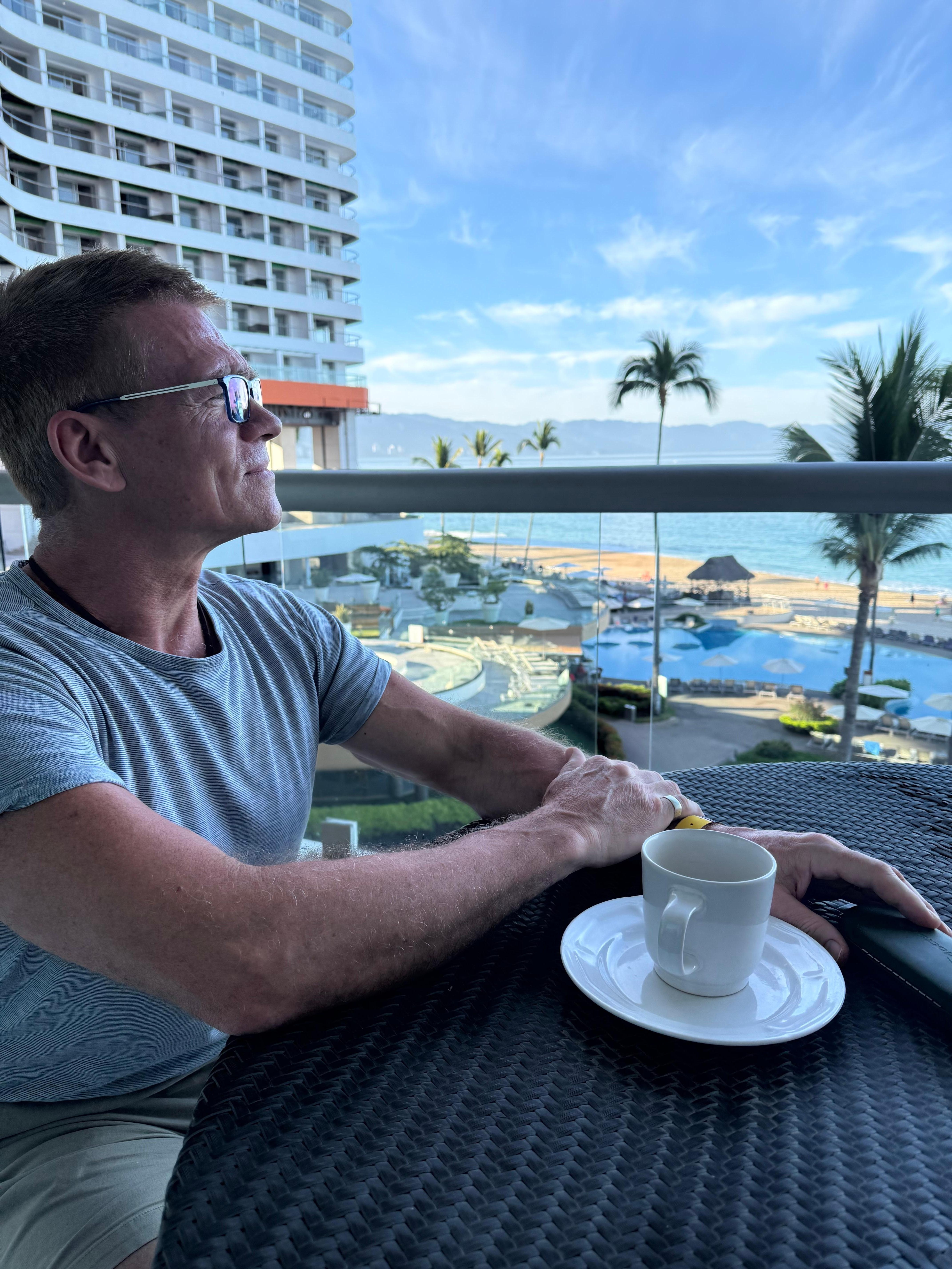 Hotel view with morning coffee 