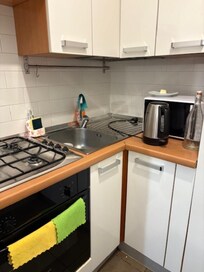 the kitchen- small refrigerator to the right of the microwave. That's it!