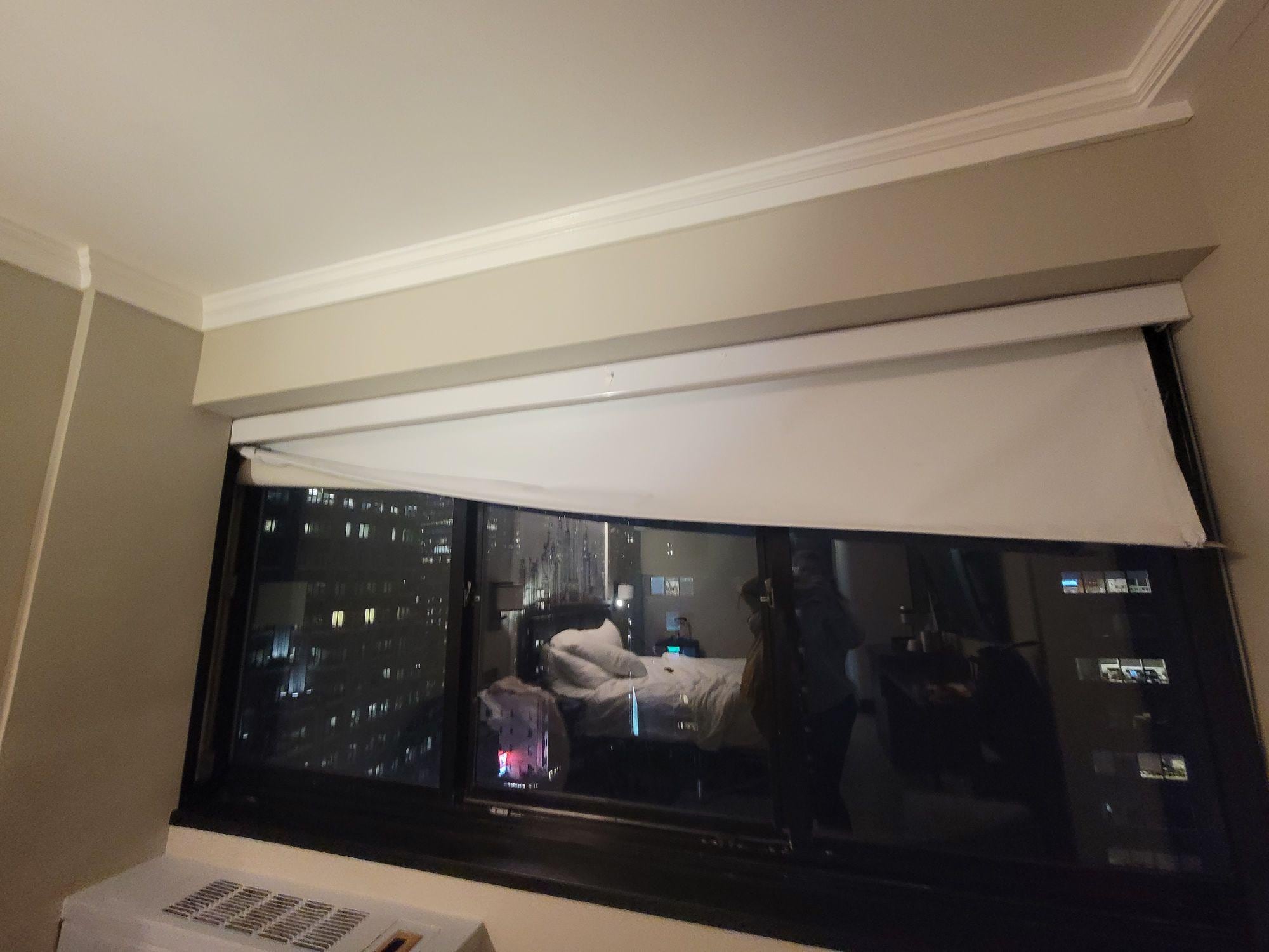 Broken shade. Windows frames were clearly needing replacement. 