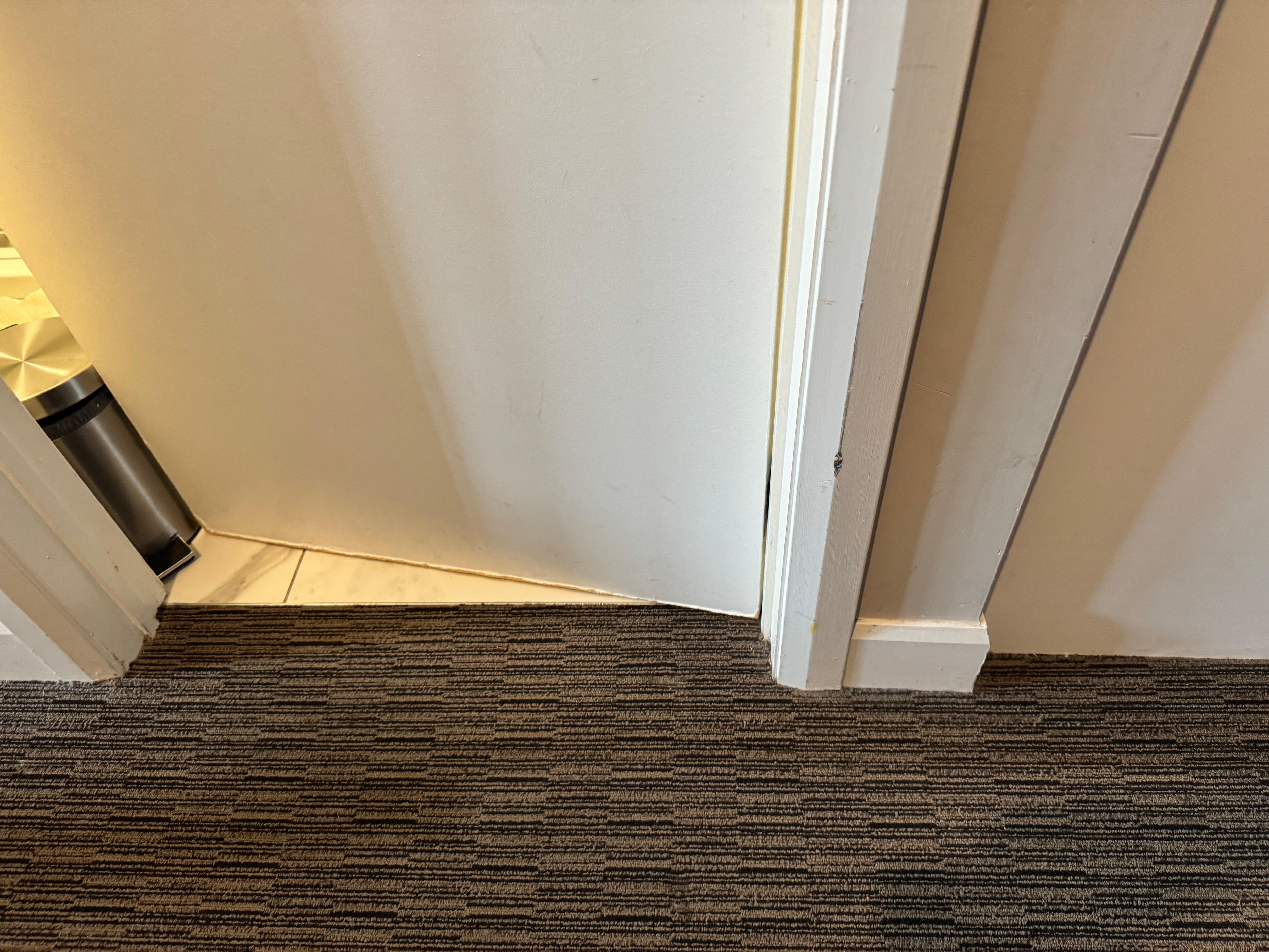 Bathroom door so swollen doesn’t open well 