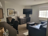 Living room (excuse the folded linens we used on tge sleep sofa)