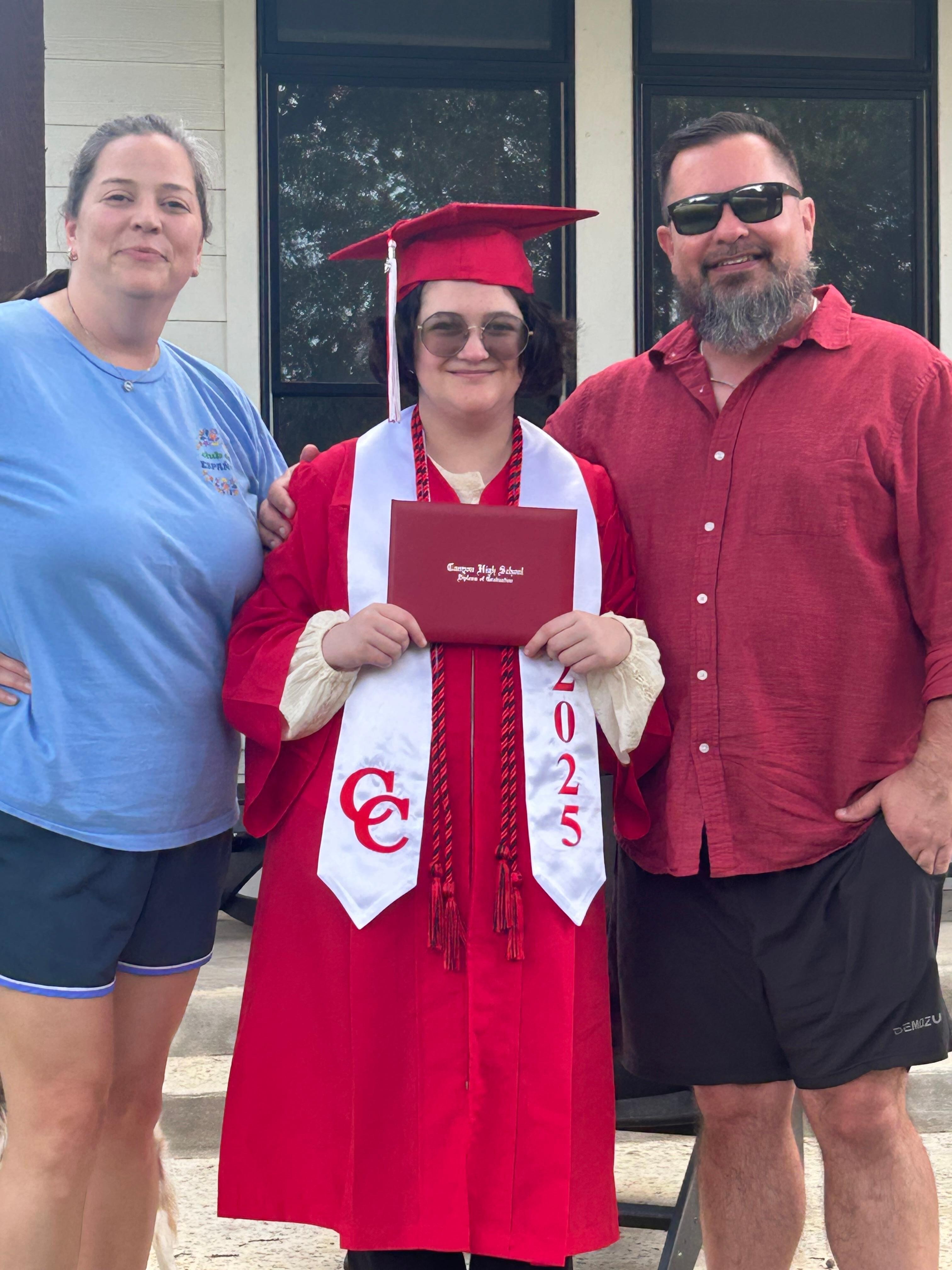 My son and daughter in law with the graduate