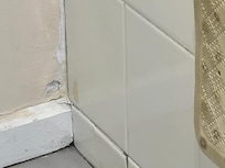 Dirty corners and patched paintwork. Not been refurbished in years.